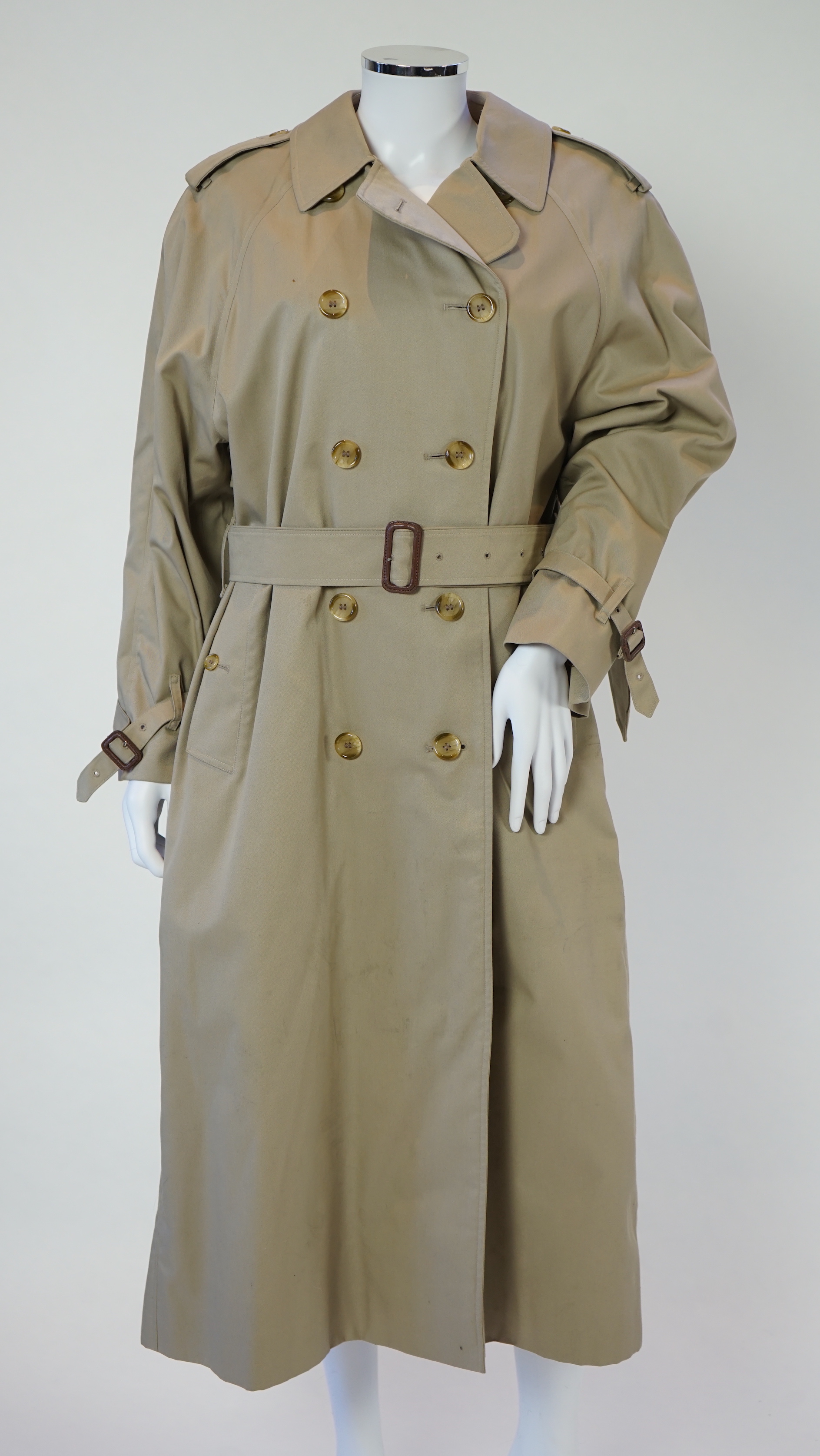 A lady's Burberry trench coat with padded detachable lining, size 12